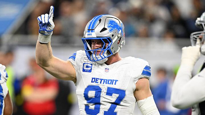 Dec 4, 2025; Detroit, Michigan, USA; Detroit Lions defensive end Aidan Hutchinson (97) reacts after a play during the second half against the Dallas Cowboys at Ford Field. Mandatory Credit: Lon Horwedel-Imagn Images