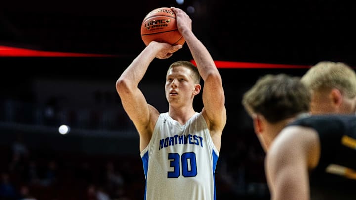 Waukee Northwest's Landon Davis (30) shoots a free throw on Monday, March 10, 2025, at Wells Fargo Arena in Des Moines.