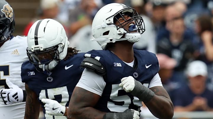Sep 6, 2025; University Park, Pennsylvania, USA; Penn State Nittany Lions defensive tackle Xavier Gilliam (54) after tackling  Florida International Panthers running back Anthony Carrie (6) for a loss of yards during the first quarter at Beaver Stadium. Mandatory Credit: Matthew O'Haren-Imagn Images