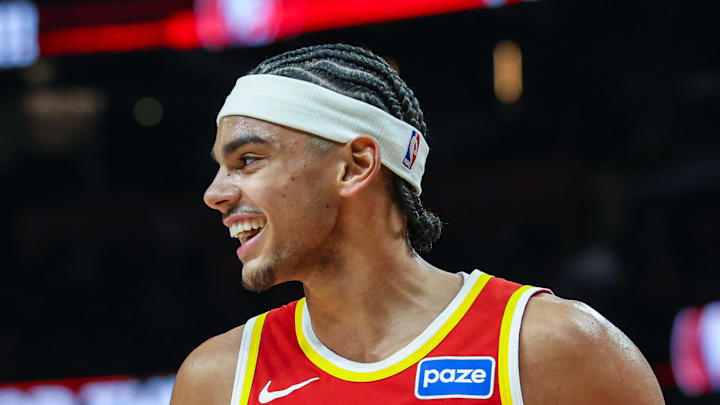 Atlanta Hawks forward Asa Newell reacts in the game against the Chicago Bulls during the third quarter at State Farm Arena