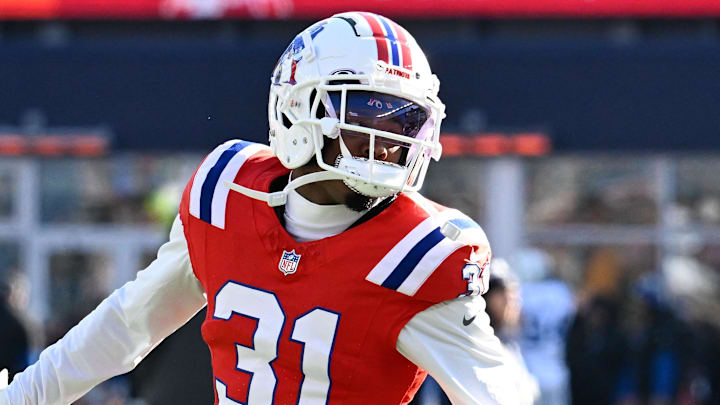 Dec 1, 2024; Foxborough, Massachusetts, USA; New England Patriots cornerback Jonathan Jones (31) warms up before a game against the Indianapolis Colts at Gillette Stadium. Mandatory Credit: Eric Canha-Imagn Images