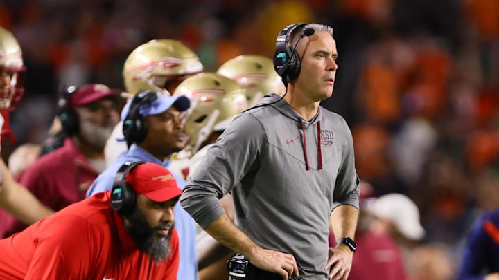 Oct 26, 2024; Miami Gardens, Florida, USA; Florida State Seminoles head coach Mike Norvell watches from the sideline against the Miami Hurricanes during the second quarter at Hard Rock Stadium. Mandatory Credit: Sam Navarro-Imagn Images