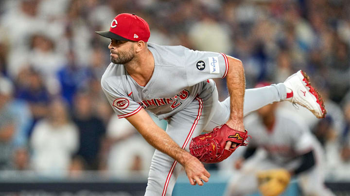 Cincinnati Reds starting pitcher Nick Martinez (28) throws a pitch in relief in the sixth inning of the MLB National League Wild Card Game 2 between the Los Angeles Dodgers and the Cincinnati Reds at Dodger Stadium in Los Angeles on Wednesday, Oct. 1, 2025. The Reds were eliminated from the postseason with an 8-4 loss to the reining World Series Champions La Dodgers.