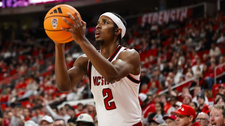 Jan 27, 2026; Raleigh, North Carolina, USA; NC State Wolfpack guard Jr. Paul McNeil (2) shoots a three pointer during the first half of the game against the Syracuse Orange at Lenovo Center. Mandatory Credit: Jaylynn Nash-Imagn Images