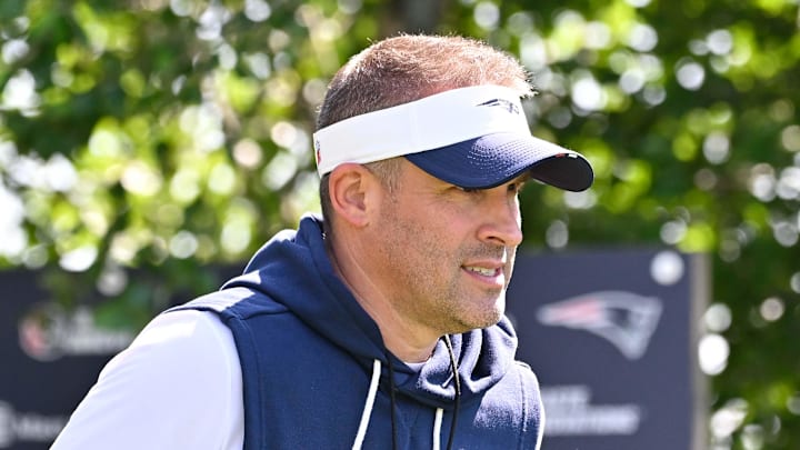 New England Patriots offensive coordinator Josh McDaniels heads to the practice fields for training camp. New England Patriots offensive coordinator Josh McDaniels heads to the practice fields for training camp.