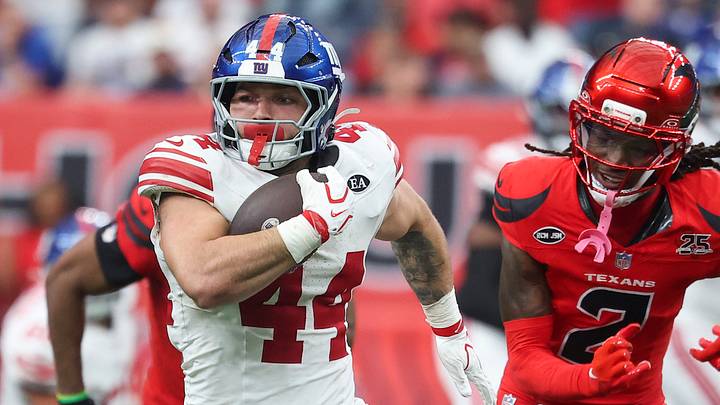 Oct 25, 2026; Houston, Texas, USA; New York Giants running back Cam Skattebo (44) runs with the ball during overtime against the Houston Texans at Reliant Stadium. Oct 25, 2026; Houston, Texas, USA; New York Giants running back Cam Skattebo (44) runs with the ball during overtime against the Houston Texans at Reliant Stadium.