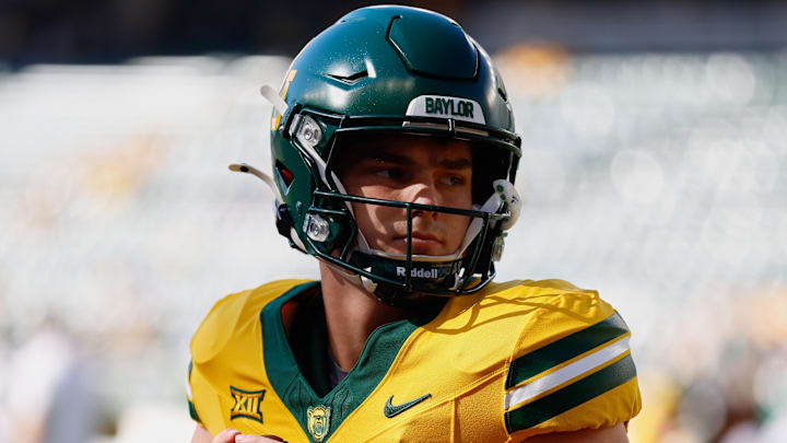 Oct 4, 2025; Waco, Texas, USA; Baylor Bears quarterback Sawyer Robertson (13) warms up before the game against the Kansas State Wildcats at McLane Stadium. Mandatory Credit: Chris Jones-Imagn Images Oct 4, 2025; Waco, Texas, USA; Baylor Bears quarterback Sawyer Robertson (13) warms up before the game against the Kansas State Wildcats at McLane Stadium. Mandatory Credit: Chris Jones-Imagn Images