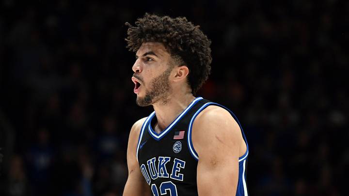 Dec 2, 2025; Durham, North Carolina, USA; Duke Blue Devils forward Cameron Boozer (12) reacts during the second half against the Florida Gators at Cameron Indoor Stadium.  The Blue Devils won 67-66. Mandatory Credit: Rob Kinnan-Imagn Images