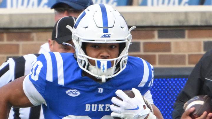 Oct 17, 2026; Durham, North Carolina, USA; Duke Blue Devils running back Nate Sheppard (20) runs the ball against North Carolina Tar Heels defensive back Coleman Bryson (16) and defensive back Jaiden Patterson (18) during the first quarter at Wallace Wade Stadium. Mandatory Credit: Zachary Taft-Imagn Images Oct 17, 2026; Durham, North Carolina, USA; Duke Blue Devils running back Nate Sheppard (20) runs the ball against North Carolina Tar Heels defensive back Coleman Bryson (16) and defensive back Jaiden Patterson (18) during the first quarter at Wallace Wade Stadium. Mandatory Credit: Zachary Taft-Imagn Images