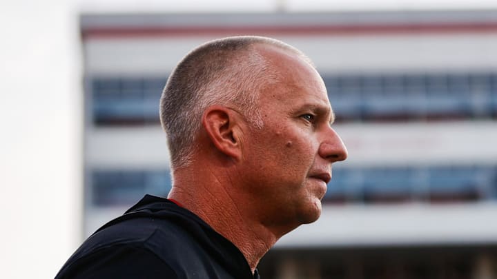 Aug 28, 2025; Raleigh, North Carolina, USA; North Carolina State Wolfpack head coach Dave Doeren looks on during the warmups prior to the game against East Carolina Pirates at Carter-Finley Stadium. Mandatory Credit: Jaylynn Nash-Imagn Images Aug 28, 2025; Raleigh, North Carolina, USA; North Carolina State Wolfpack head coach Dave Doeren looks on during the warmups prior to the game against East Carolina Pirates at Carter-Finley Stadium. Mandatory Credit: Jaylynn Nash-Imagn Images