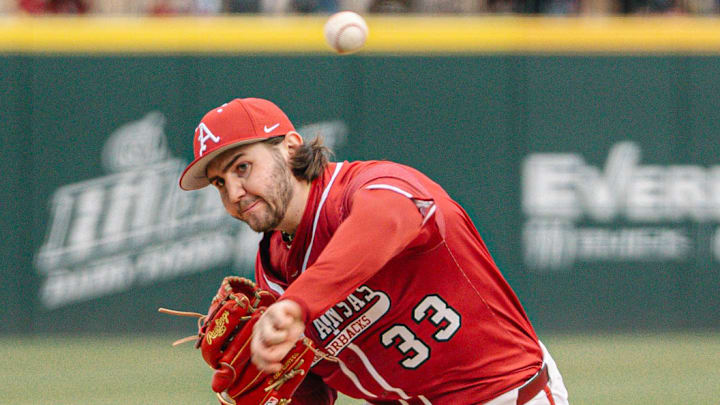 Arkansas Razorbacks pitcher Zach Root delivers a pitch against Washington State on Friday afternoon in the second game of a doubleheader.