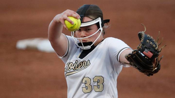 Purdue Boilermakers starting pitcher/relief pitcher Julia Gossett (33) pitches.