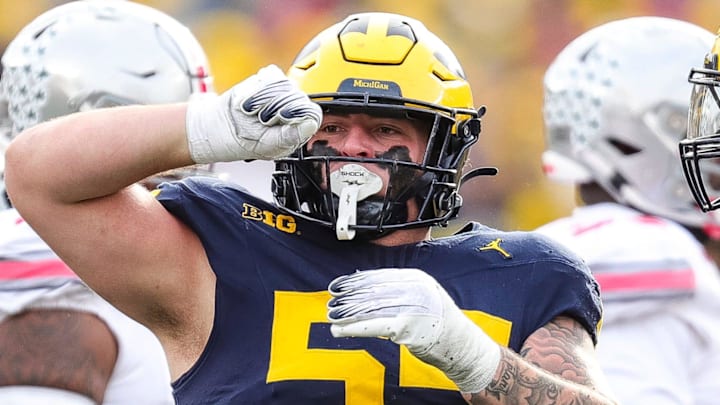 Michigan defensive lineman Mason Graham celebrates a tackle against Ohio State during the second half at Michigan Stadium in Ann Arbor on Saturday, Nov. 25, 2023.