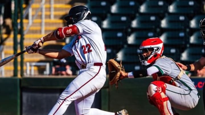 Stoneman Douglas senior third baseman Jake Rizzo (22), shown here in a 2025 postseason game, has led the five-time defending state champion Eagles to a 14-3 start and the No. 3 ranking in this week's High School on SI Florida Baseball Top 25.