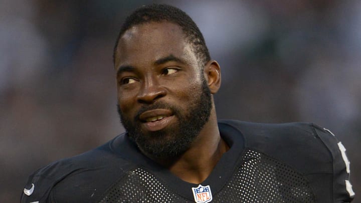 Aug 28, 2014; Oakland, CA, USA; Oakland Raiders defensive end Justin Tuck (91) against the Seattle Seahawks at O.co Coliseum. Mandatory Credit: Kirby Lee-Imagn Images