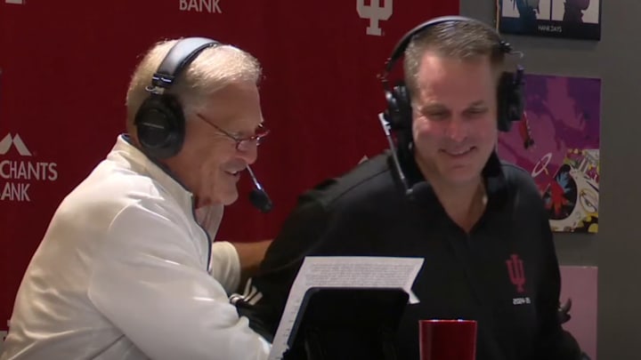 Indiana football voice Don Fischer (left) and coach Curt Cignetti (right) Sept. 18, 2025, at Hoosier Hank's in Bloomington.