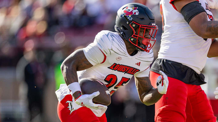 Nov 16, 2024; Stanford, California, USA;  Louisville Cardinals running back Isaac Brown (25) runs the ball during the first quarter against the Stanford Cardinal at Stanford Stadium.