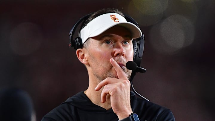 Nov 7, 2025; Los Angeles, California, USA; Southern California Trojans head coach Lincoln Riley watches game action against the Northwestern Wildcats during the second half at the Los Angeles Memorial Coliseum. Mandatory Credit: Gary A. Vasquez-Imagn Images