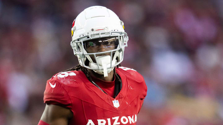 Jan 5, 2025; Glendale, Arizona, USA; Arizona Cardinals wide receiver Marvin Harrison Jr. (18) against the San Francisco 49ers at State Farm Stadium. Mandatory Credit: Mark J. Rebilas-Imagn Images