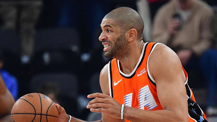 Dec 28, 2025; Inglewood, California, USA; Los Angeles Clippers forward Nicolas Batum (33) moves the ball up court against the Detroit Pistons with guard James Harden (1) during the first half at Intuit Dome. Mandatory Credit: Gary A. Vasquez-Imagn Images