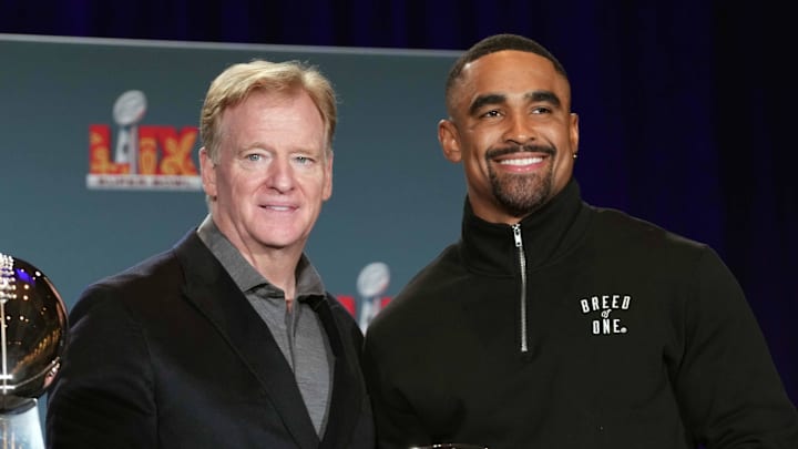 Goodell presents Jalen Hurts with the Super Bowl LIX MVP award.