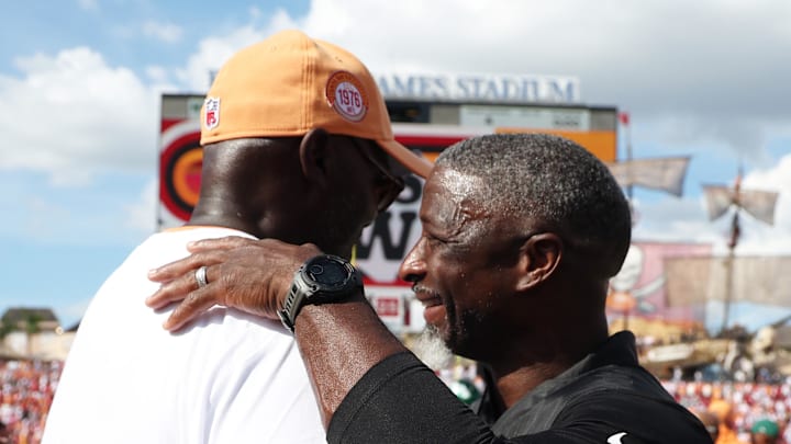 Tampa Bay Buccaneers head coach Todd Bowles and New York Jets head coach Aaron Glenn greet after the game 