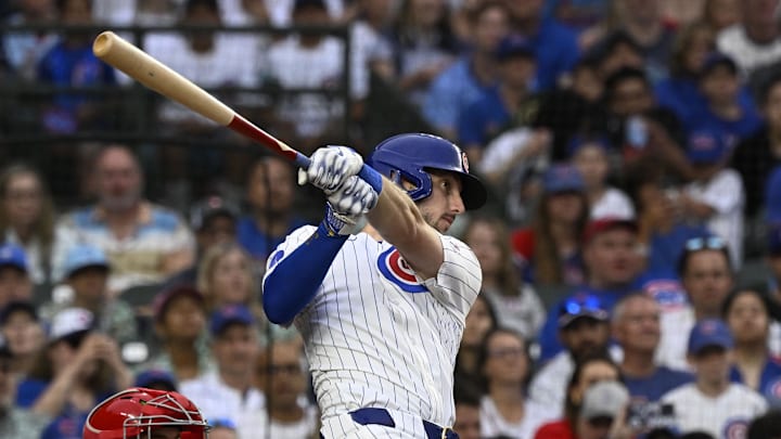 Chicago Cubs outfielder Kyle Tucker (30) hits a two RBI single against the St. Louis Cardinals during the third inning at Wrigley Field on July 6.
