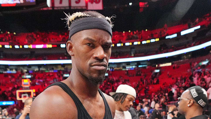 Jan 19, 2025; Miami, Florida, USA;  Miami Heat forward Jimmy Butler (22) walks off the court after greeting court-side friends following the victory over the San Antonio Spurs at Kaseya Center. Mandatory Credit: Jim Rassol-Imagn Images