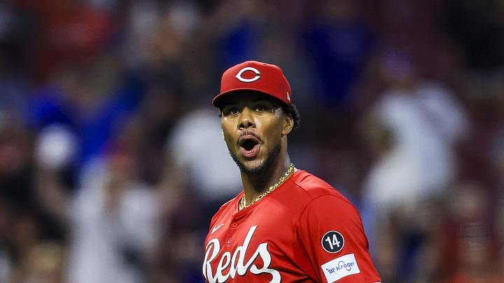 Cincinnati Reds starting pitcher Hunter Greene (21) reacts