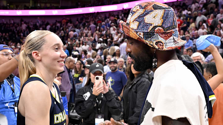 Jun 27, 2025; Dallas, Texas, USA; Dallas Mavericks point guard Kyrie Irving talks with Dallas Wings guard Paige Bueckers (5) after the game against the Indiana Fever at the American Airlines Center. Mandatory Credit: Jerome Miron-Imagn Images Jun 27, 2025; Dallas, Texas, USA; Dallas Mavericks point guard Kyrie Irving talks with Dallas Wings guard Paige Bueckers (5) after the game against the Indiana Fever at the American Airlines Center. Mandatory Credit: Jerome Miron-Imagn Images