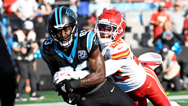 Nov 24, 2024; Charlotte, North Carolina, USA; Carolina Panthers wide receiver David Moore (83) catches a touchdown as Kansas City Chiefs cornerback Trent McDuffie (22) defends in the third quarter at Bank of America Stadium. Mandatory Credit: Bob Donnan-Imagn Images Nov 24, 2024; Charlotte, North Carolina, USA; Carolina Panthers wide receiver David Moore (83) catches a touchdown as Kansas City Chiefs cornerback Trent McDuffie (22) defends in the third quarter at Bank of America Stadium. Mandatory Credit: Bob Donnan-Imagn Images