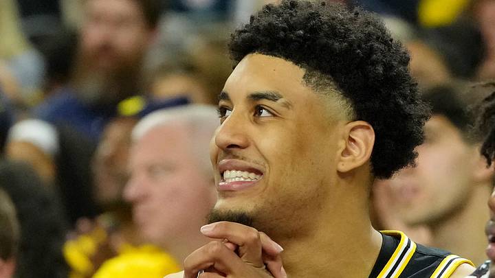 Apr 4, 2026; Indianapolis, IN, USA; Michigan Wolverines forward Yaxel Lendeborg (23) reacts on the bench during the second half in a semifinal of the Final Four of the men's 2026 NCAA Tournament at Lucas Oil Stadium. Mandatory Credit: Bob Donnan-Imagn Images