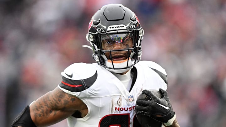 Oct 13, 2024; Foxborough, Massachusetts, USA; Houston Texans running back Joe Mixon (28) runs for a touchdown against the New England Patriots during the second half at Gillette Stadium. Mandatory Credit: Brian Fluharty-Imagn Images