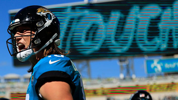 Jacksonville Jaguars quarterback Trevor Lawrence (16) celebrates his pass for a touchdown score to wide receiver Christian Kirk (13) during the second quarter of an NFL football matchup Sunday, Oct. 15, 2023 at EverBank Stadium in Jacksonville, Fla. The Jacksonville Jaguars defeated the Indianapolis Colts 37-20. [Corey Perrine/Florida Times-Union]