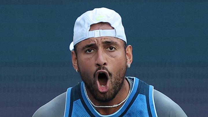 Nick Kyrgios reacts after winning a point