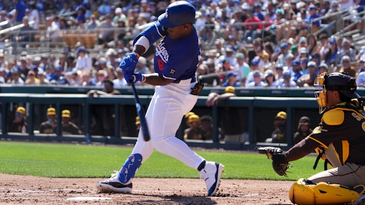 Feb 23, 2025; Phoenix, Arizona, USA; Los Angeles Dodgers right fielder Zyhir Hope (94) hits an RBI against the San Diego Padres during the second inning at Camelback Ranch-Glendale. Feb 23, 2025; Phoenix, Arizona, USA; Los Angeles Dodgers right fielder Zyhir Hope (94) hits an RBI against the San Diego Padres during the second inning at Camelback Ranch-Glendale.