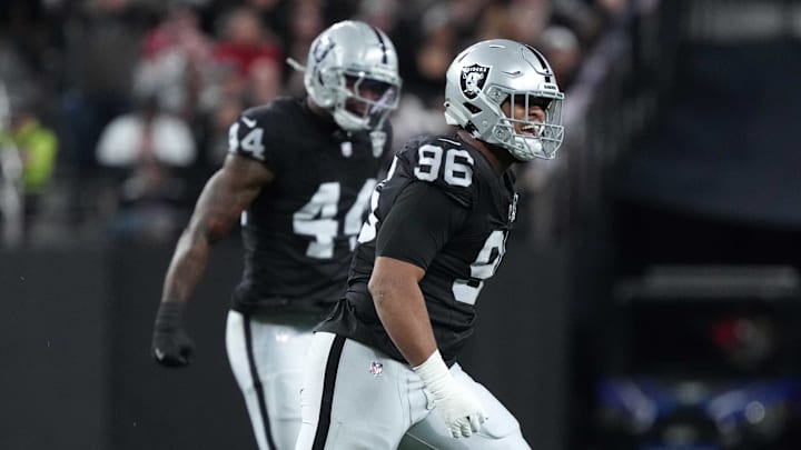 Dec 16, 2024; Paradise, Nevada, USA; Las Vegas Raiders defensive tackle Jonah Laulu (96) celebrates after a sack against the Atlanta Falcons in the first half at Allegiant Stadium. Mandatory Credit: Kirby Lee-Imagn Images