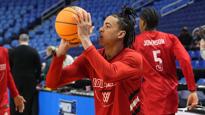 Mar 18, 2026; Buffalo, NY, USA; Louisville Cardinals Guard Mikel Brown Jr. (0) shoots the ball during a practice session ahead of the first round of the men's 2026 NCAA Tournament at Keybank Center. Mandatory Credit: Gregory Fisher-Imagn Images