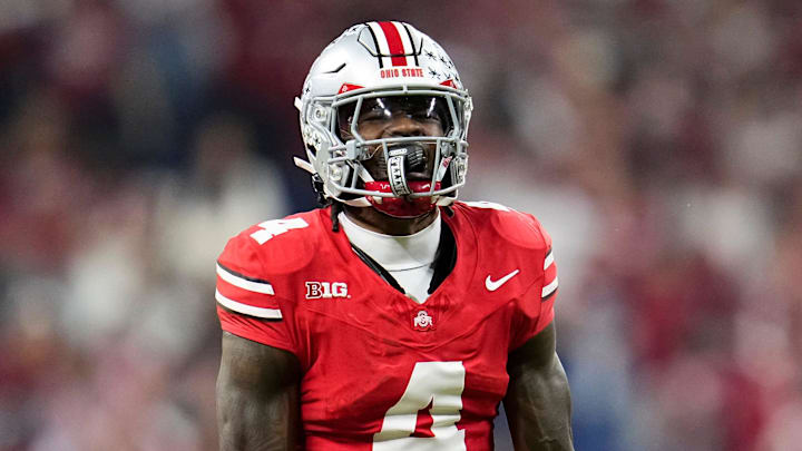 Ohio State Buckeyes wide receiver Jeremiah Smith (4) celebrates a catch during the first half of the Big Ten Conference championship game against the Indiana Hoosiers at Lucas Oil Stadium in Indianapolis on Dec. 6, 2025.