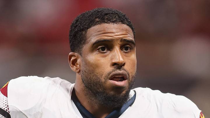 Former Washington Commanders linebacker Bobby Wagner stands on the field