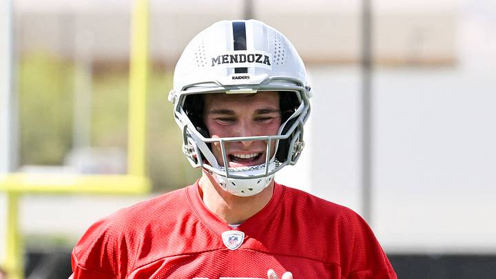 Las Vegas Raiders quarterback Fernando Mendoza warms up during organized team activities. Las Vegas Raiders quarterback Fernando Mendoza warms up during organized team activities.
