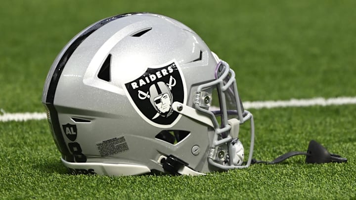 Oct 20, 2024; Inglewood, California, USA; Las Vegas Raiders helmet on the turn at SoFi Stadium during pregame warmups before an NFL game against the Los Angeles Rams. Mandatory Credit: Robert Hanashiro-Imagn Images