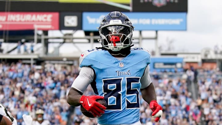 Tennessee Titans tight end Chig Okonkwo (85) runs in a touchdown against the New Orleans Saints during the second quarter at Nissan Stadium in Nashville, Tenn., Sunday, Dec. 28, 2025.