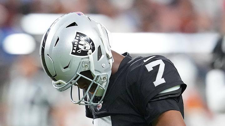 Former Las Vegas Raiders quarterback Geno Smith reacts after failing to convert.