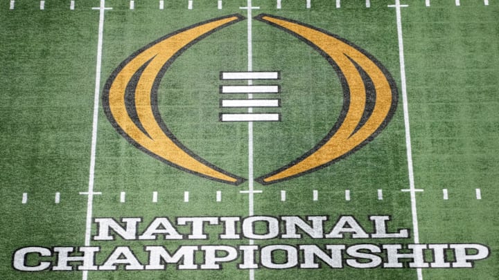 The College Football Playoff National Championship logo at midfield at Mercedes-Benz Stadium, the site of the 2025 national championship between the Ohio State Buckeyes and the Notre Dame Fighting Irish. The College Football Playoff National Championship logo at midfield at Mercedes-Benz Stadium, the site of the 2025 national championship between the Ohio State Buckeyes and the Notre Dame Fighting Irish.