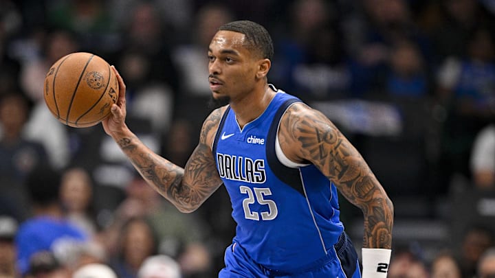 Dallas Mavericks forward P.J. Washington brings the ball up court against the Brooklyn Nets during the first quarter at the American Airlines Center. Mandatory Credit: Jerome Miron-Imagn Images