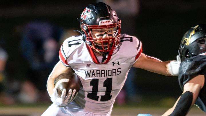 Muskego running back Aiden Perlberg (11) sprints upfield versus Franklin in a Classic 8 Conference game on September 25, 2026. Muskego running back Aiden Perlberg (11) sprints upfield versus Franklin in a Classic 8 Conference game on September 25, 2026.