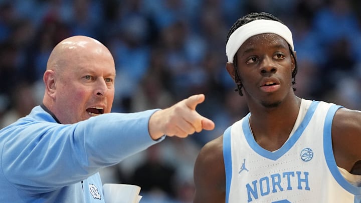 Dec 7, 2025; Chapel Hill, North Carolina, USA; North Carolina Tar Heels assistant coach Pat Sullivan with forward Caleb Wilson (8) in the second half at Dean E. Smith Center. Mandatory Credit: Bob Donnan-Imagn Images Dec 7, 2025; Chapel Hill, North Carolina, USA; North Carolina Tar Heels assistant coach Pat Sullivan with forward Caleb Wilson (8) in the second half at Dean E. Smith Center. Mandatory Credit: Bob Donnan-Imagn Images