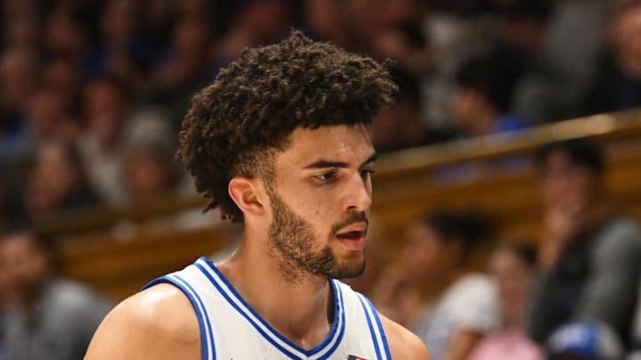 Feb 16, 2026; Durham, North Carolina, USA; Duke Blue Devils forward Cameron Boozer (12) interacts with his teammates during the during the first half against the Syracuse Orange at Cameron Indoor Stadium. Mandatory Credit: Zachary Taft-Imagn Images Feb 16, 2026; Durham, North Carolina, USA; Duke Blue Devils forward Cameron Boozer (12) interacts with his teammates during the during the first half against the Syracuse Orange at Cameron Indoor Stadium. Mandatory Credit: Zachary Taft-Imagn Images