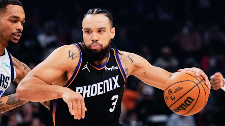 Phoenix Suns guard/forward Dillon Brooks drives the ball against Dallas Mavericks forward P.J. Washington during the first half the game at Mortgage Matchup Center. Phoenix Suns guard/forward Dillon Brooks drives the ball against Dallas Mavericks forward P.J. Washington during the first half the game at Mortgage Matchup Center.